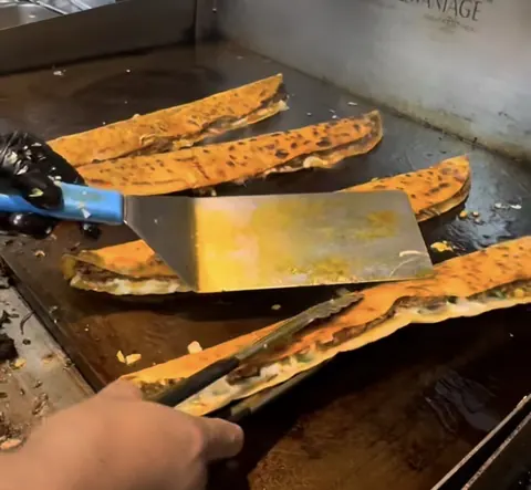 Birria quesadillas on the griddle